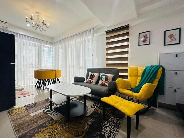Living area - SMTH Suites - Yellow One (Taguig)