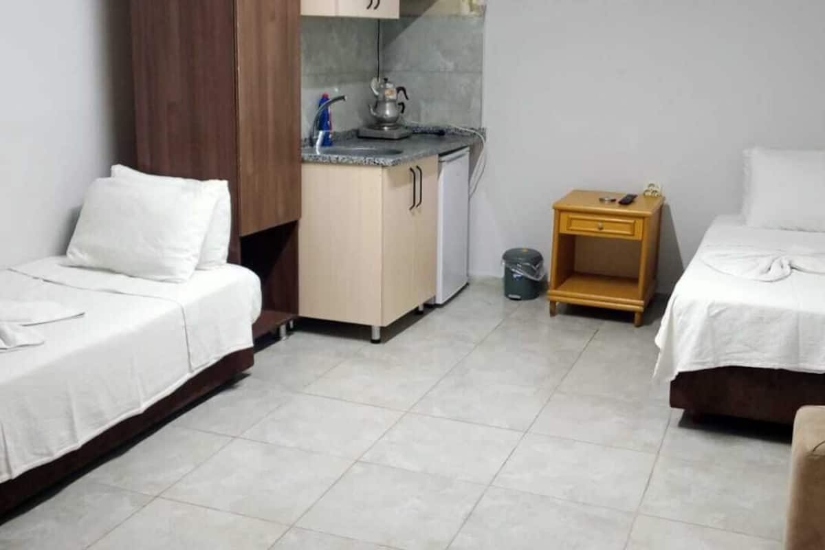 1 dormitorio y ropa de cama de alta calidad