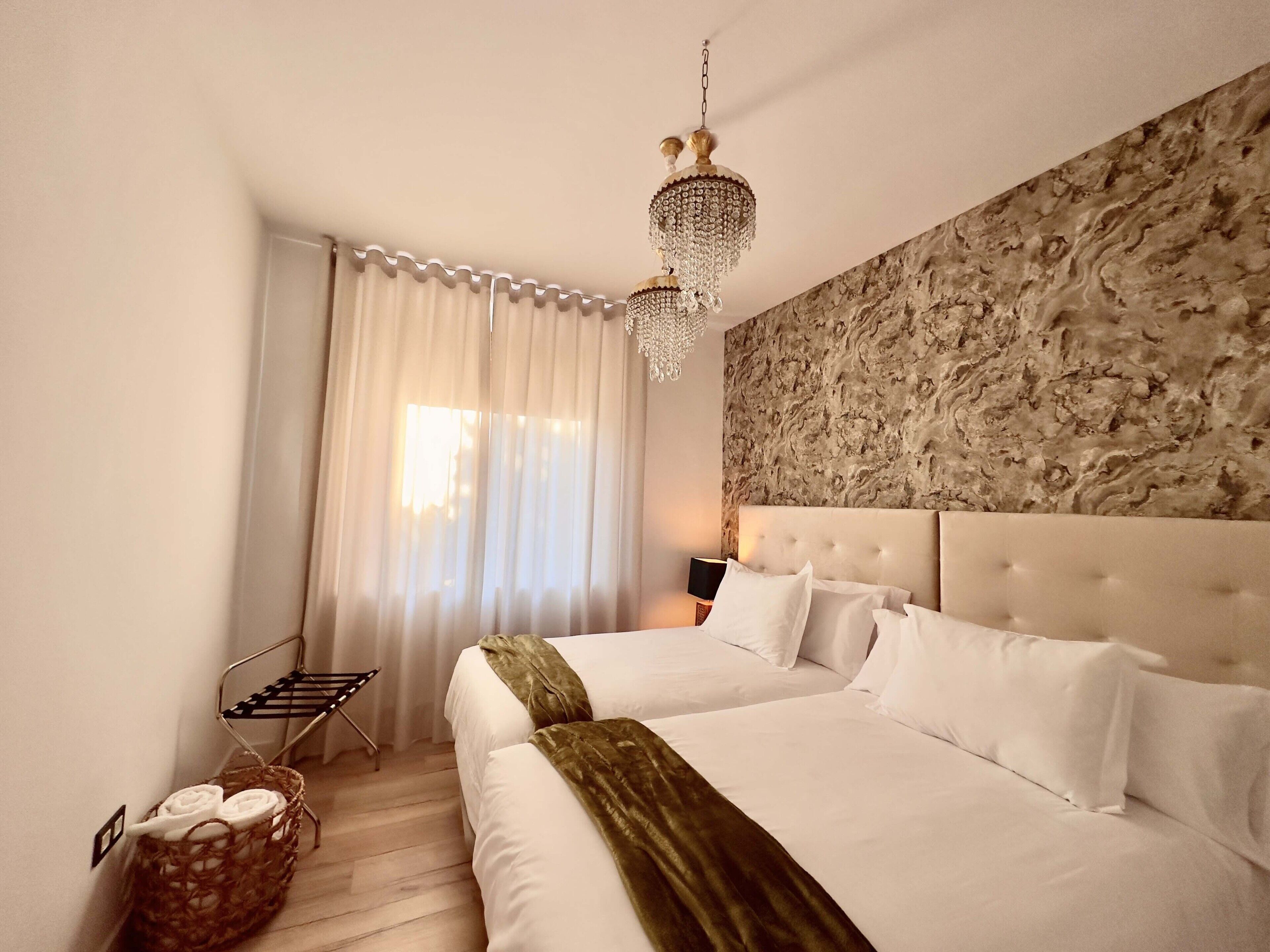 5 slaapkamers, een strijkplank/strijkijzer, gratis wifi, beddengoed