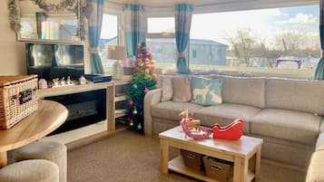 Cabin | Living area | TV, fireplace