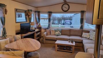 Cabin | Living area | TV, fireplace