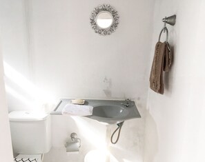 Hair dryer, towels, soap, toilet paper