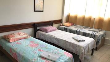 Quarto básico | 1 quarto, Wi-Fi de cortesia, roupa de cama