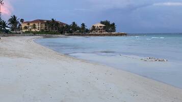 On the beach, sun-loungers, beach towels