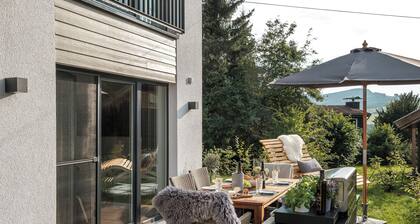 Ferienhaus Sonnenweg 32 - Sauna, Garten und Seeblick Inklusive