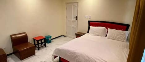 Habitación Deluxe doble | Tabla de planchar con plancha y wifi gratis