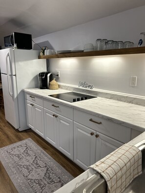 Fridge, microwave, stovetop, coffee/tea maker