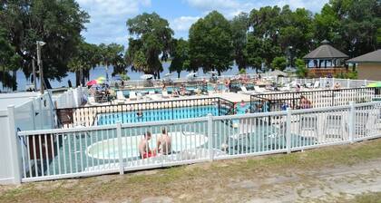 Super roomy Park Model in premier resort with lake, pools, dock and boat launch.
