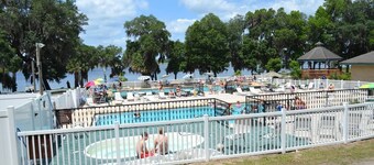 Super roomy Park Model in premier resort with lake, pools, dock and boat launch.