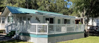 Super roomy Park Model in premier resort with lake, pools, dock and boat launch.