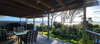 Home with gorgeous mountain and water views