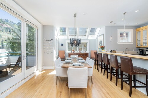 Sunny & Spacious Condo | Wall-to-Wall Windows, Deck + Parking | Steps to Hiking  & Town