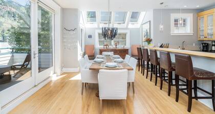 Sunny & Spacious Condo | Wall-to-Wall Windows, Deck + Parking | Steps to Hiking & Town