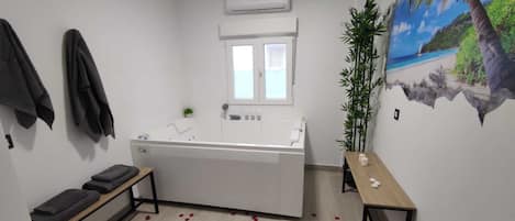 Hair dryer, towels, soap, shampoo