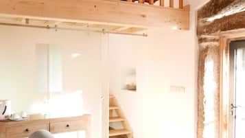 Suite Old Oven House | Coin séjour | TV connectée de 35 pouces avec chaßnes numériques