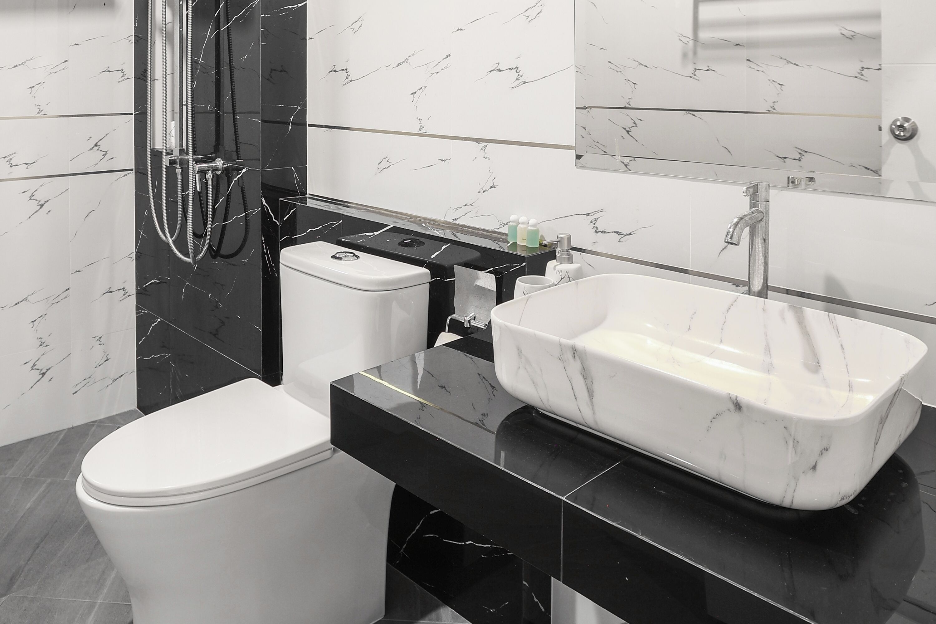 family room | bathroom | shower, rainfall showerhead, hair dryer, towels