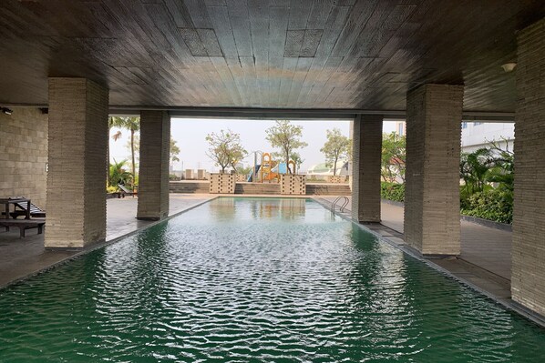 Outdoor pool - Gracia Room Apartemen Grand Dhika City Bekasi (Bekasi)