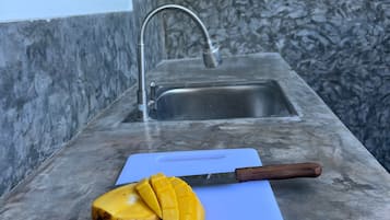Comfort Apartment | Private kitchen | Full-size fridge, microwave, toaster, cookware/dishes/utensils