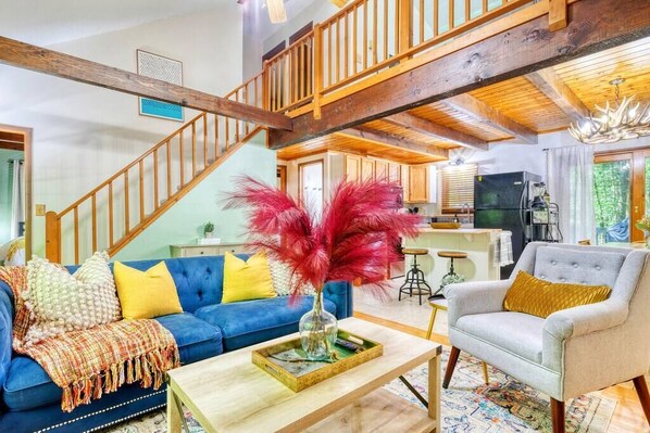 Télévision, cheminée, baby-foot