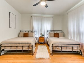 2 bedrooms, desk, iron/ironing board, travel crib