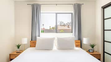3 habitaciones, tabla de planchar con plancha, wifi y ropa de cama