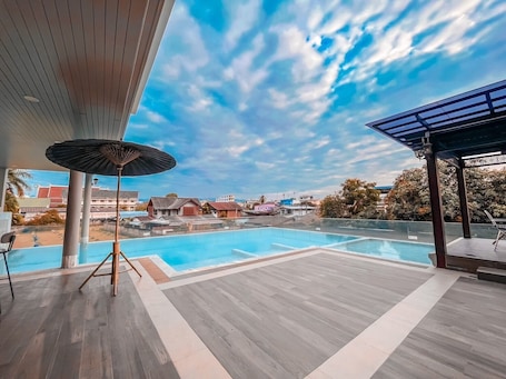 Outdoor pool, open 7:00 AM to 9:00 PM, free cabanas