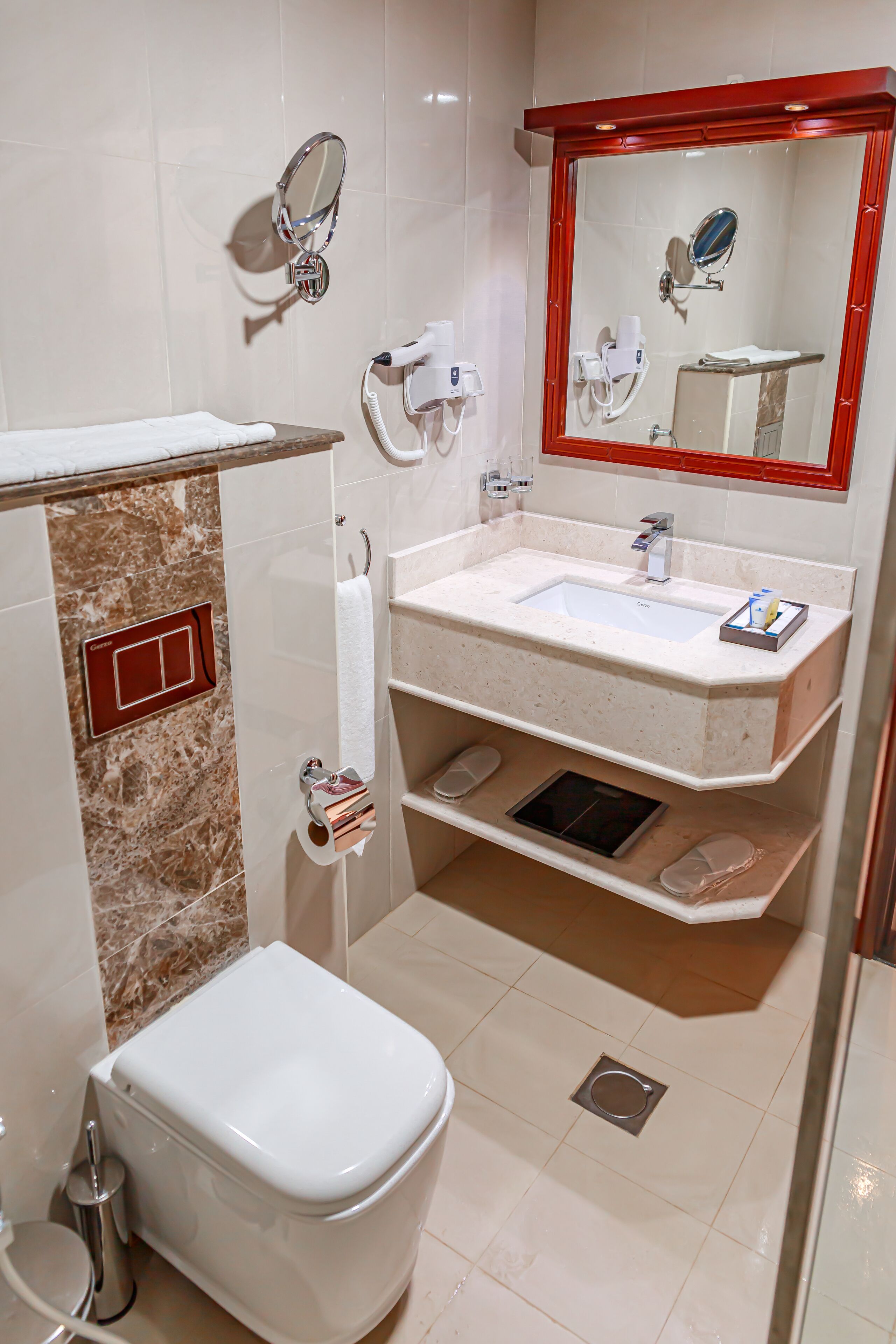 executive suite | bathroom | shower, rainfall showerhead, hair dryer, slippers
