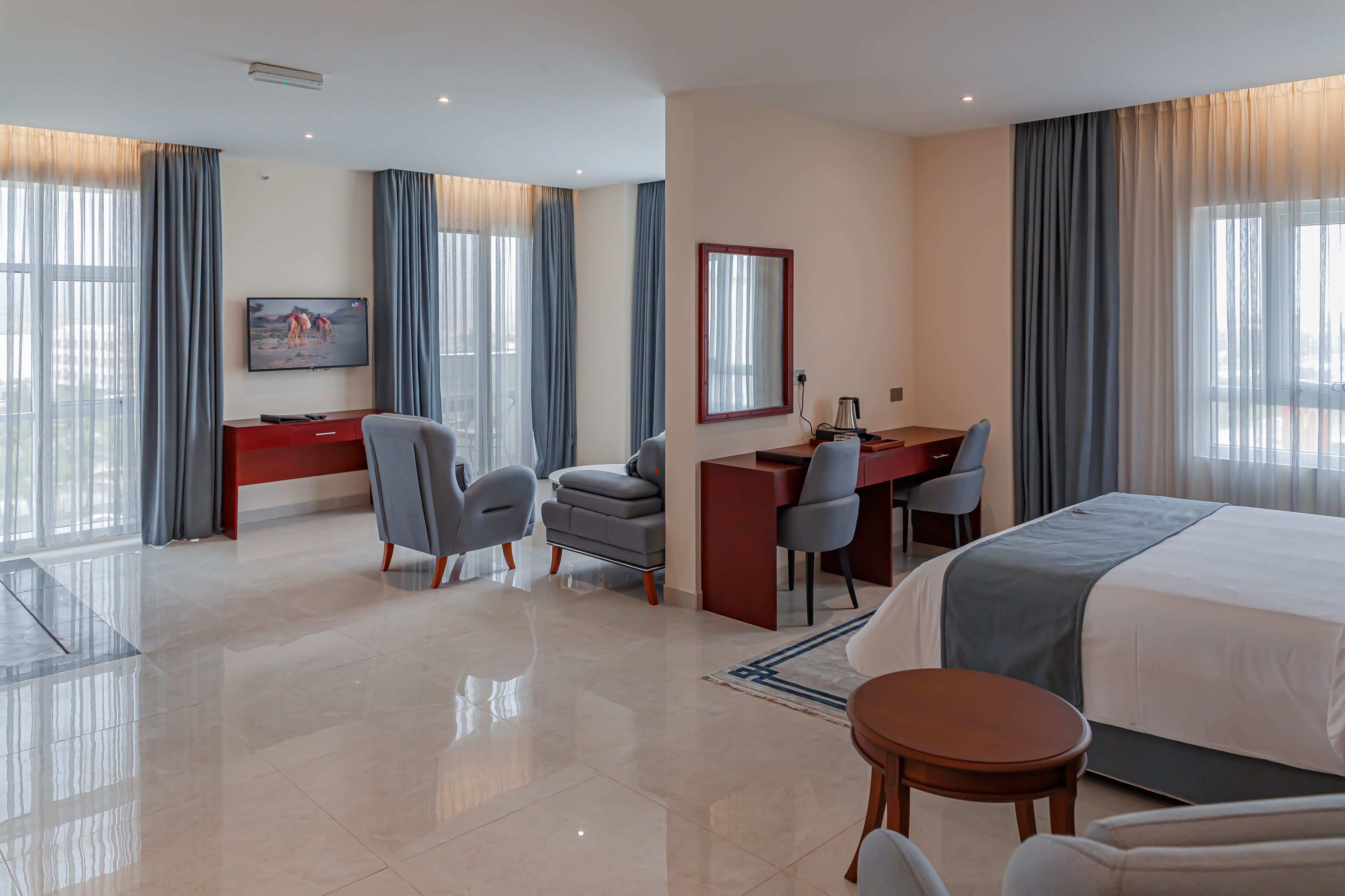 junior suite | hypo-allergenic bedding, down duvets, in-room safe, desk