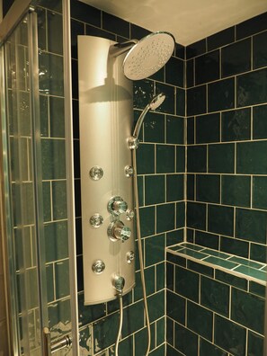 Shower, hair dryer, towels, soap