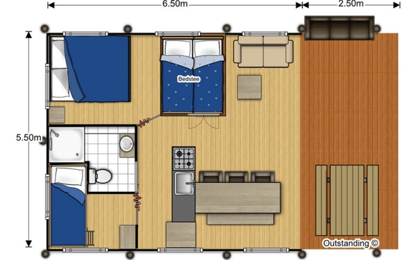 A floor plan of a cabin with a bed, a sofa, a small kitchen, and a dining area.