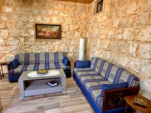 Premium Apartment, 1 Bedroom, Kitchen, Mountain View | Living area | 55-inch LED TV with satellite channels