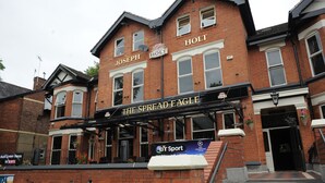 A brick building with a sign reading "The Spread Eagle." - The Spread Eagle (Manchester)