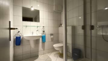 Shower, free toiletries, hair dryer, towels