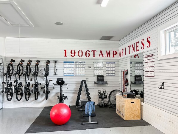 In the garage is your own private gym area with free weights, bike, and more.