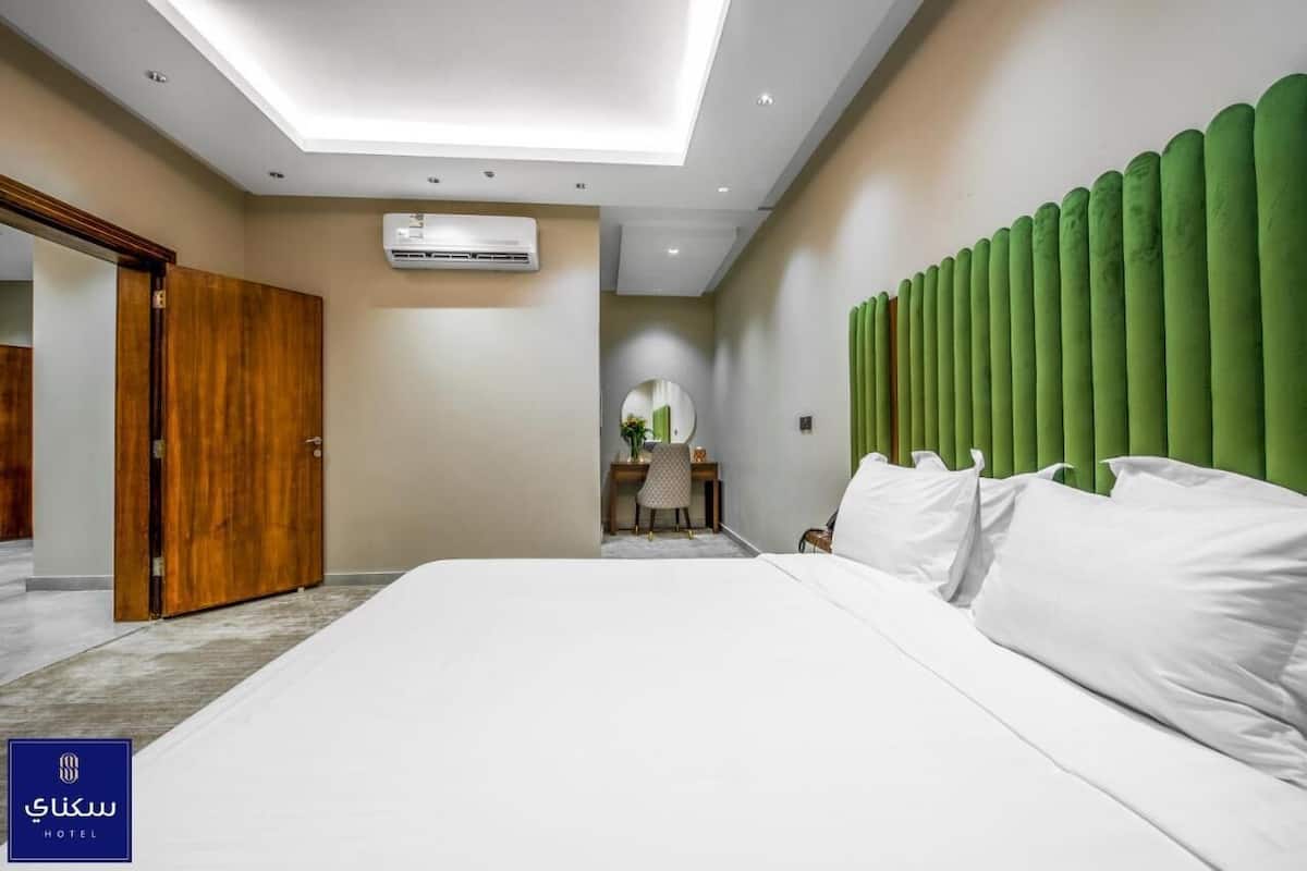 Departamento familiar | Tabla de planchar con plancha, wifi gratis y ropa de cama