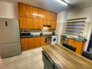 Apartment | Private kitchen | Fridge, microwave, oven, stovetop