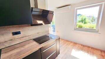 Standard Apartment | Private kitchen | Full-sized fridge, oven, dishwasher, electric kettle