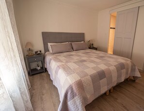 1 bedroom, desk, iron/ironing board, travel cot