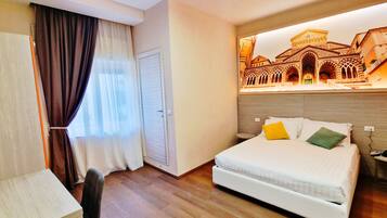 Superior kamer | Hypoallergeen beddengoed, een minibar, een kluis op de kamer