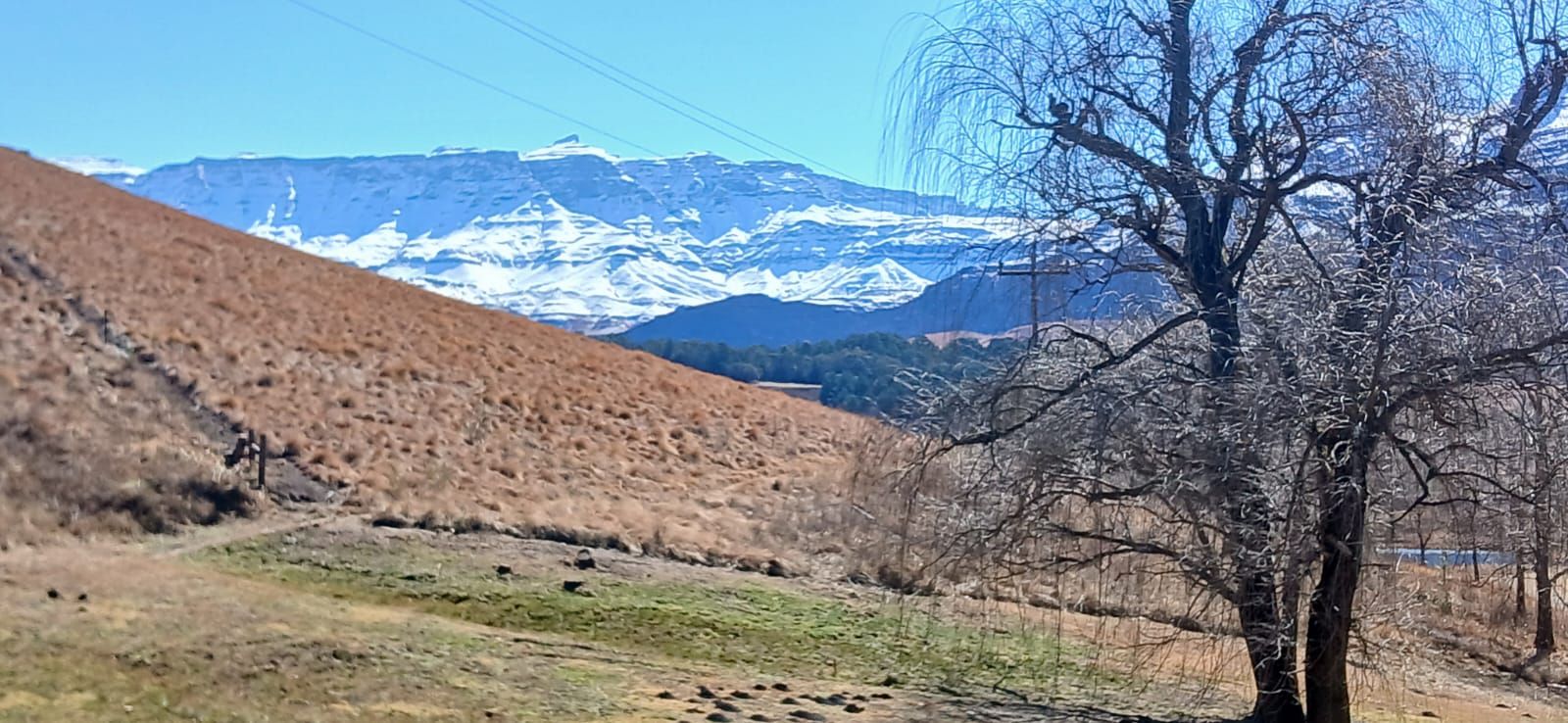 A mountainous landscape with a clear sky.