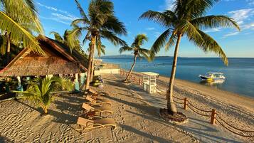 On the beach, snorkelling, beach bar, kayaking