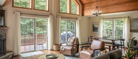 Smart TV, fireplace, table football, books