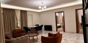 Studio, 2 Bedrooms | In-room safe, desk, iron/ironing board, free WiFi