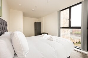 1 slaapkamer, een strijkplank/strijkijzer, internet, beddengoed