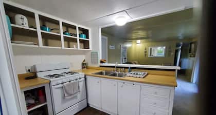 Clean old single-wide in Sand Lake, MI. Pet Friendly, near White Pine Trail