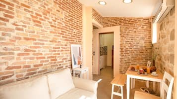 City Apartment | Living area | 42-inch plasma TV with cable channels