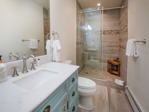 Bathtub, hair dryer, towels