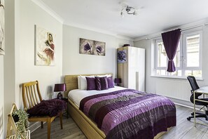 Apartamento básico, varias camas | 2 dormitorios, escritorio, espacio para trabajar con un portátil