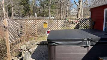 Bañera de hidromasaje al aire libre