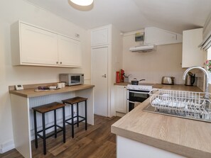 Fridge, toaster, cookware/dishes/utensils